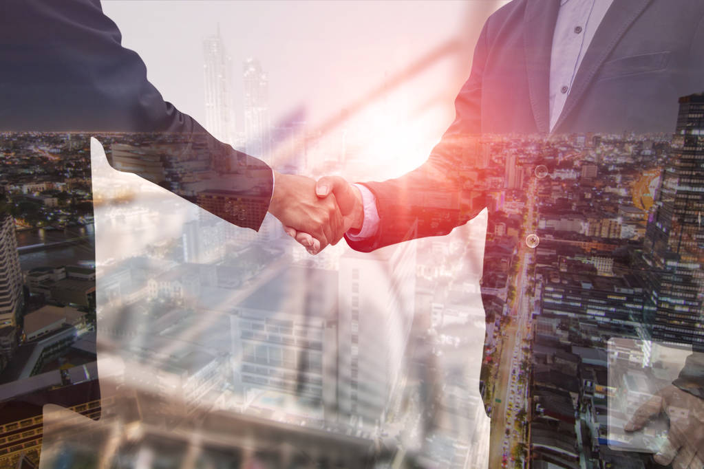 business exposure of business people shake hand with partner, su